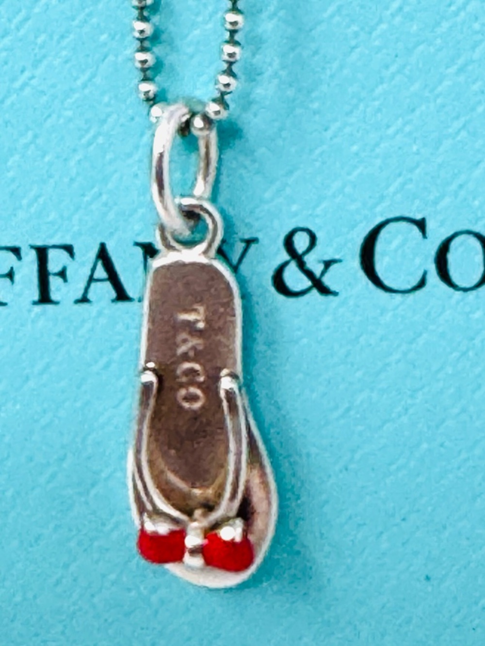 Authentic Tiffany & Co. Enamel Red  Flip-Flop Pendant Necklace.